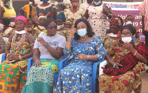 Madam Otiko Djaba with some residents of Somanya in the Yilo Krobo District