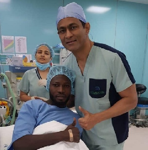 Seidu Salifu and his doctor pose for the camera after the surgery