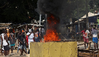 Residents protest after ransacking a half-built makeshift hospital for the coronavirus disease