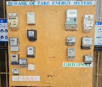 A display of fake meters alongside the original ones on a notice board