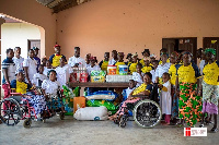 The Co-Founder and Country Director of SWISS Foundation, Francis Daffor presenting the items