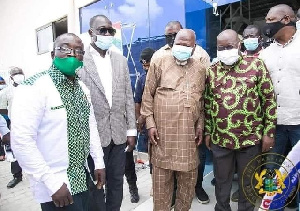 Allotey Jacobs in a photoshoot with President Nana Akufo-Addo at one of the factories