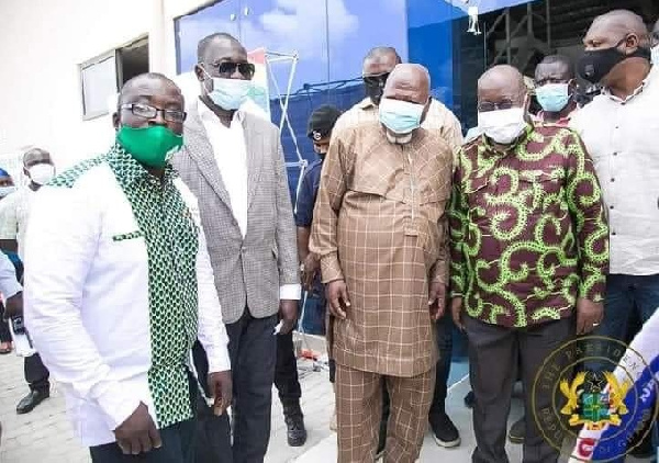 Allotey Jacobs in a photoshoot with President Nana Akufo-Addo at one of the factories