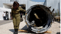 Israel's military displays what it says is an Iranian ballistic missile retrieved from the Dead Sea
