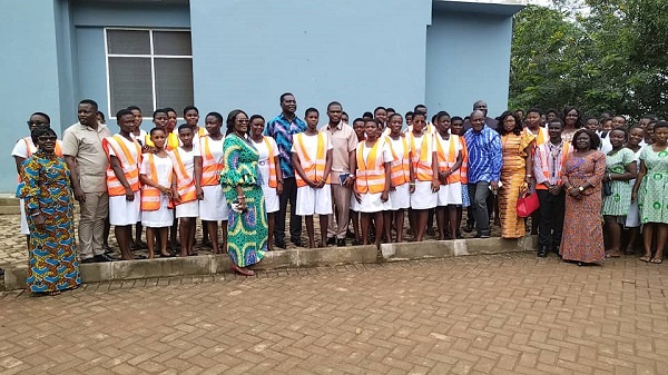 A group picture of the education minister, staff and students of Afia Kobi Ampem Girls SHS