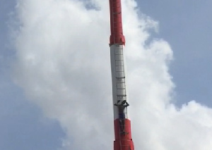 The victim climbing the mast