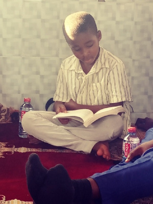 A boy reading a book