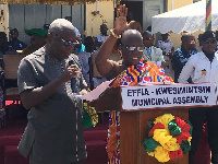 Municipal Chief Executive, Kojo Acquah [hands held high]