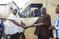 Joseph Adda handing over the ambulance Kologo Health Centre