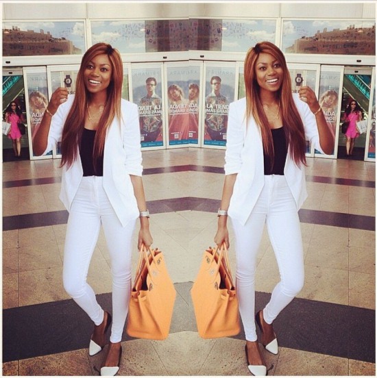 Yvonne Nelson in White suit with a black vest