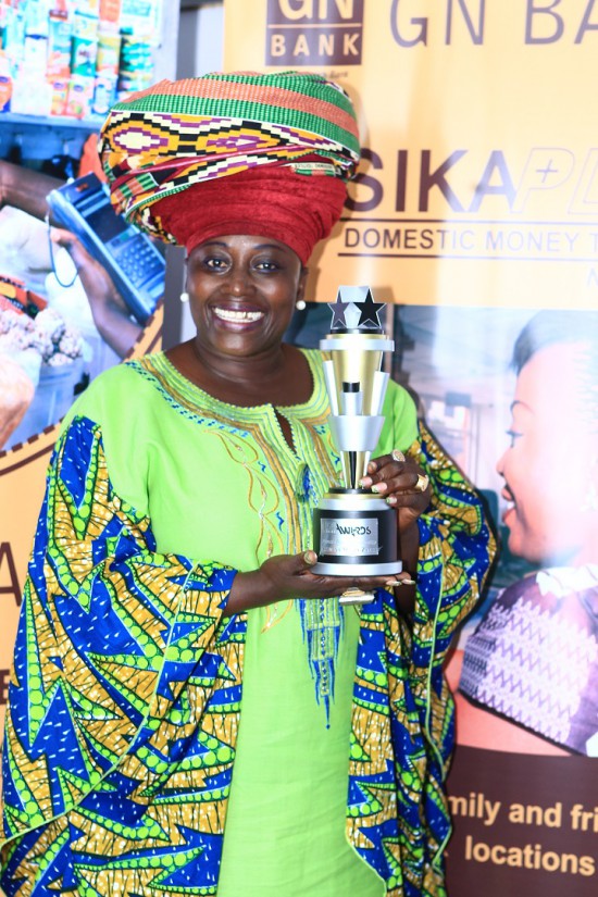 Akumaa Mama Zimbi with her Awards Plaque