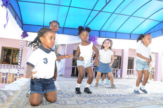 Oyeame Kwame's daughter in black shoes