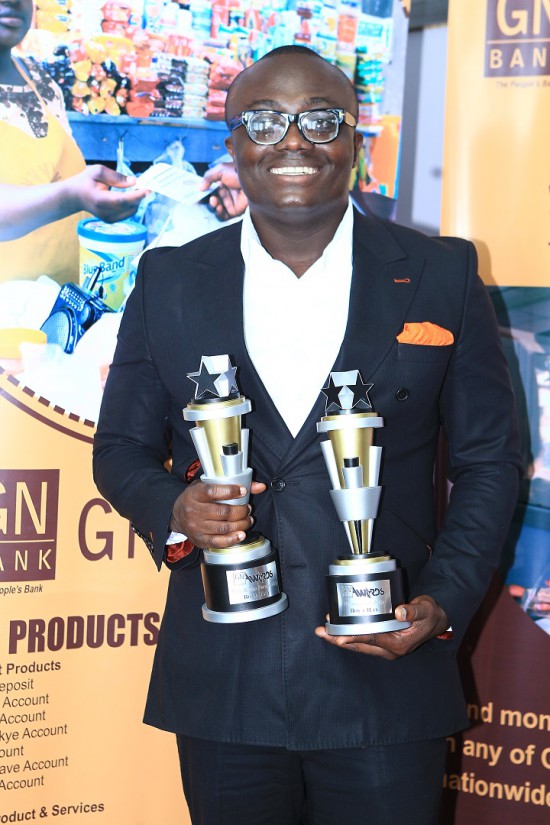 Bola Ray with his plaques