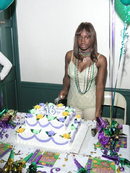 Delores gets ready to cut her birthday cake