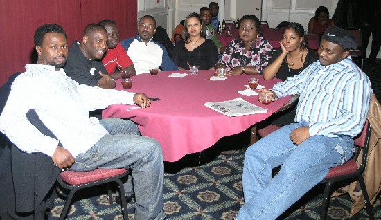 Ghanaweb fans seated at a table and relaxing