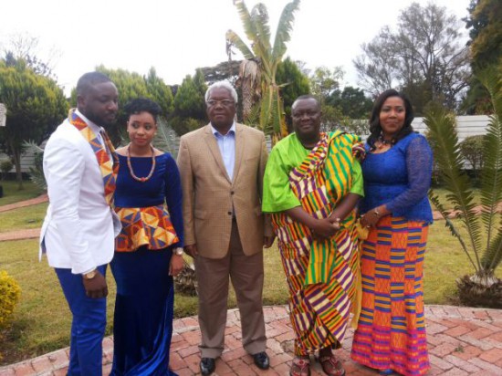 Elikem in a pose with his wife and in-laws