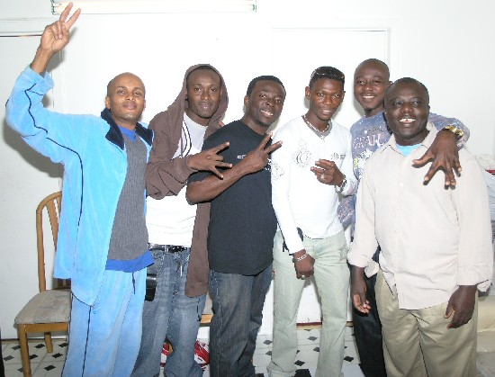 Agya Koo and his crew pose