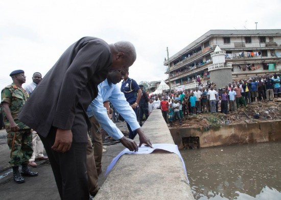 Mahama inspecting the hydrological maps of Aboabo