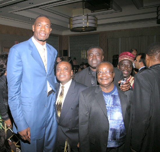 Group of Ghanaians who attended the $500 a plate event posed with Mutombo