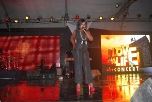 Kaakie on them heels...whah guan girl @ <em>'I love ma life concert'</em>