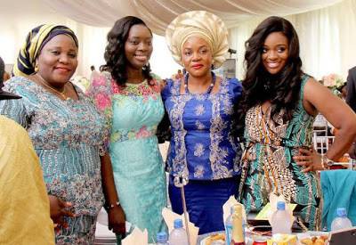 Jackie poses with the First Lady and other patrons at the event