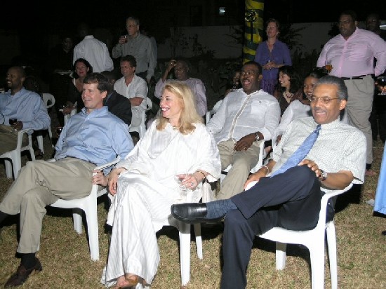 Time for a laugh; seated on the front row from left is; Mr. William M. Campbell III, President of Discovery Networks (left), Ms Bernadette B. Paolo, Vice President, The Africa Society  and Mr. Robinson, Jr.