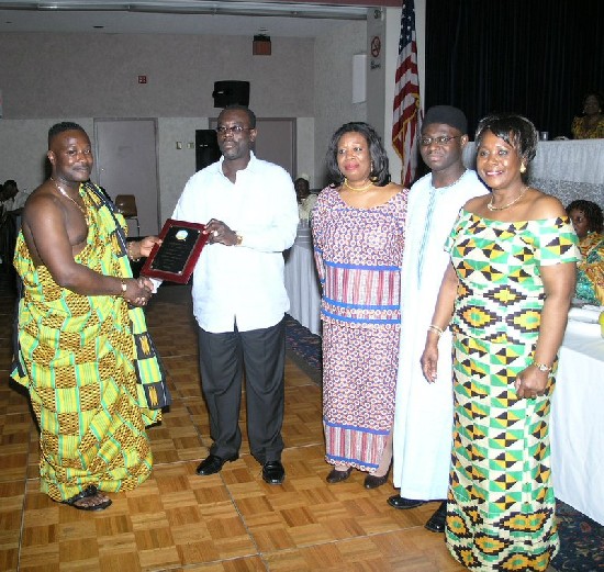 Nana Koo Fosu, former President is presented with his award