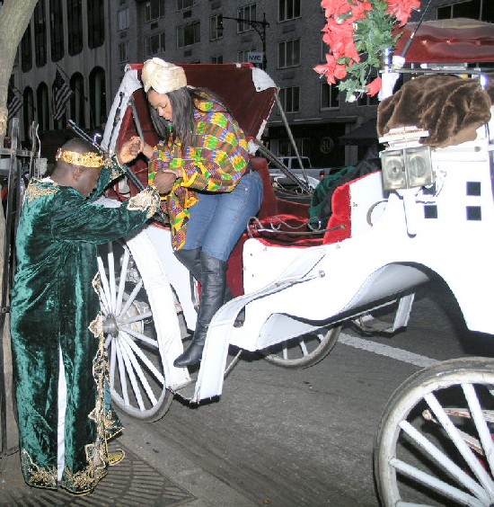 Papa Shee assists Jojo off the horse carriage