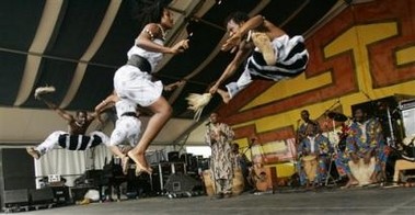 Members of Nii Tetley Tetteh & the Kusun Ensemble of Ghana during the 2006 New Orleans Jazz and Heritage Festival in New Orleans on Sunday, May 7, 2006. Dancers from left: Isaac Allotey, Rita Tawiah, Martha Ayi Kwei and Osendah Michael