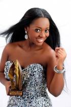 Jackie Appiah swags with her recent AMVCA statuette