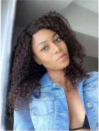 Yvonne Nelson shows off cleavage and stomach