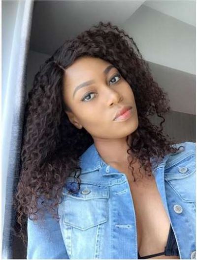 Yvonne Nelson shows off cleavage and stomach