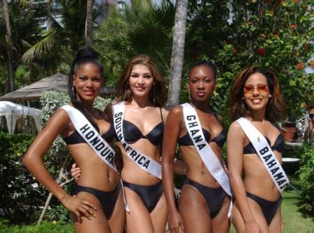 Miss Universe 2002 delegates Miss Honduras Erika Lizet Ramirez, Miss South Africa Vanessa Carreira, Miss Ghana Stephanie Walkins-Fia and Miss Bahamas Nadia Rodgers-Albury pose in their swimwear at the Inter-Continental Hotel in San Juan, Puerto Rico May 15, 2002. The 2002 Miss Universe pageant will take place May 29th and be broadcast on CBS Television.