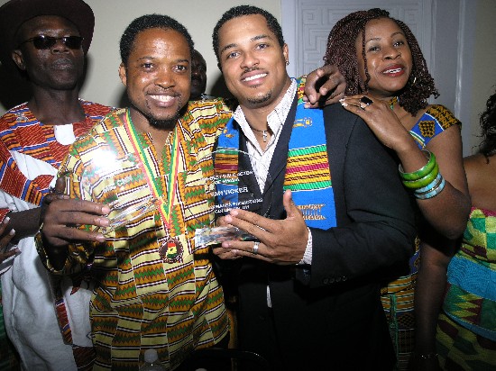 Mr. CNN and Van Vicker posing with their awards