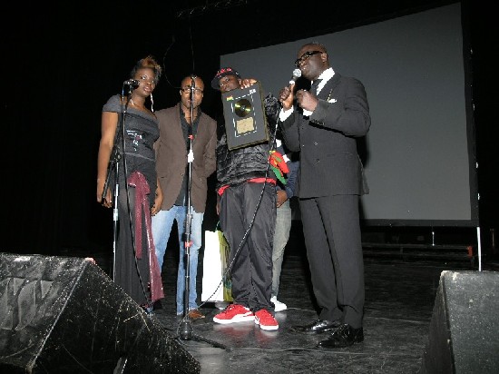 Sway, Hip-pop artist shows his award for Best Urban Act (middle) while KKD acknowledges his achievement