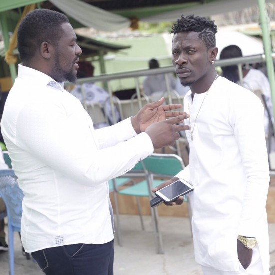 Shatta Wale with his manager