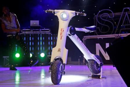 Shatta Wale on stage with the scooter