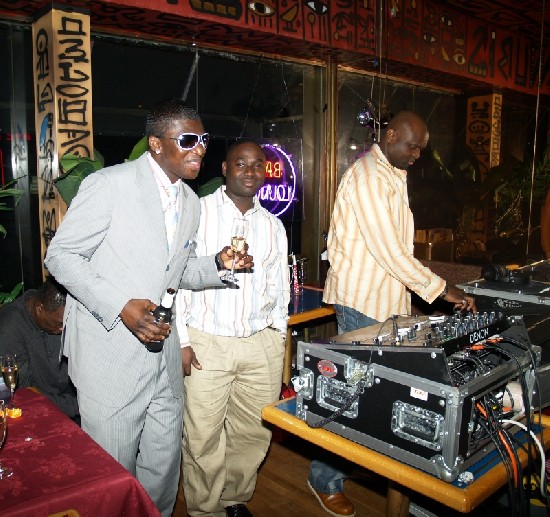 MC Papa Linc (left) DJ Dynamic having a good time while DJ Sam Q on the wheels of steel entertaining the audience.