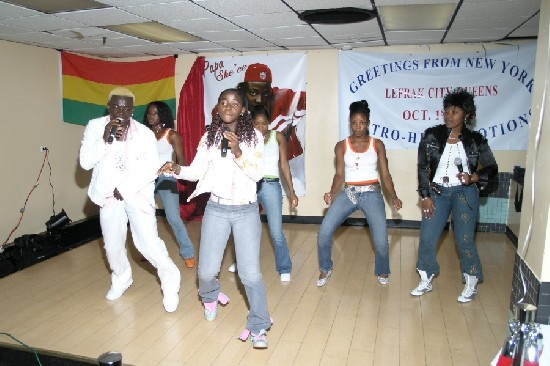 Papa Shee and his dancers performing