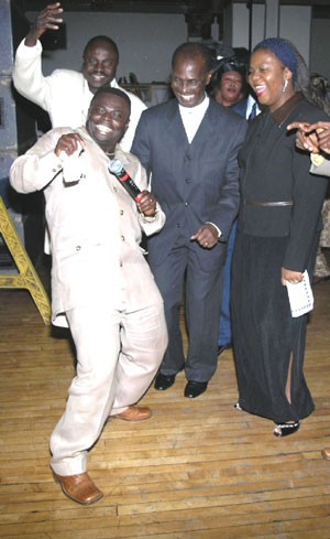 he prophet shows his moves in front of Rev. Darko and Mr. Kofi Bawuah (back row with hand raised)