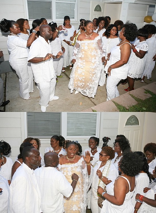 Mr & Mrs Osei Tutu surrounded by guests as they danced