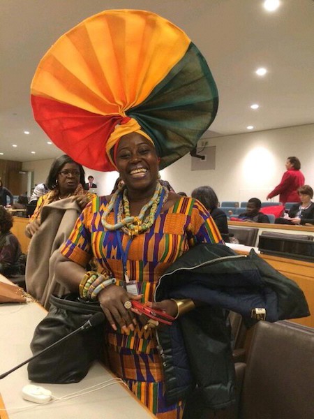 Akumaa Mama Zimbi in big Ghana headgear