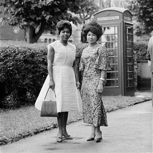 Portrait of women in formal wear in London.