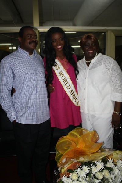 <em>Naa Okailey Shooter with parents</em>