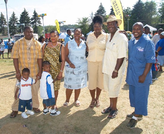 Pastor Audrey Maison, Elder Maison, second and third right respectively and group