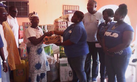 Deborah AKAKPO CSR Manager donating to the Weija Leprosarium