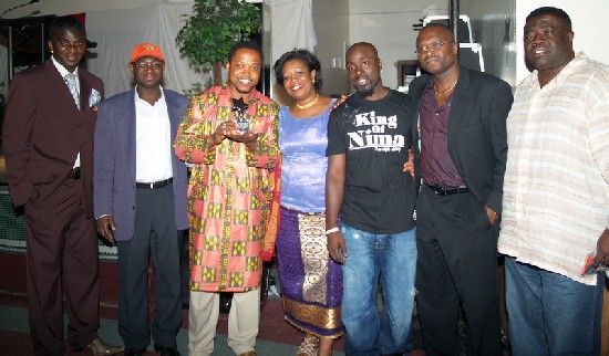 Mr. CNN posing with executives of NCOGA and Big
Hash after being presented with his award (Excellence in Media)