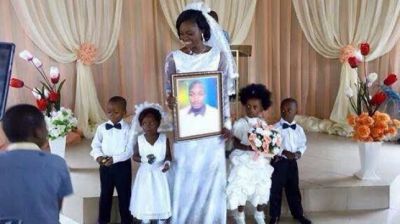 Trending on social media: Lady weds photo of husband