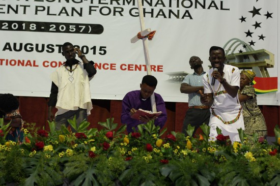 Okyeame Kwame performing on stage