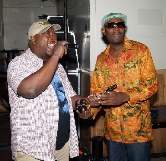 Media Personality, Dr. D/Heavy D singing before presenting Reggae Don
Dada, DJ Soul Selector with his award